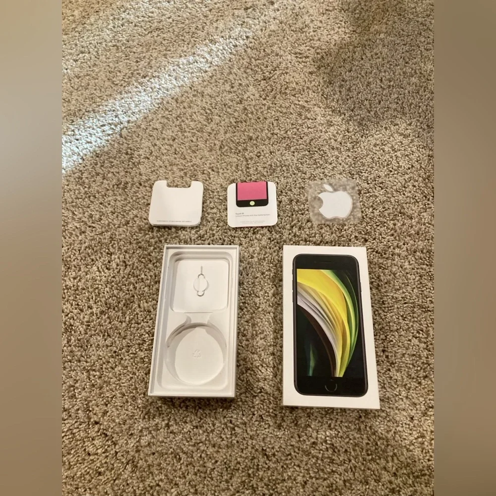 Apple iPhone SE black 64GB product box and instructions